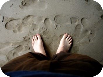 con los pies en la tierra